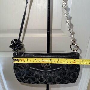 Coach Black Patterned Clutch with Floral Charm